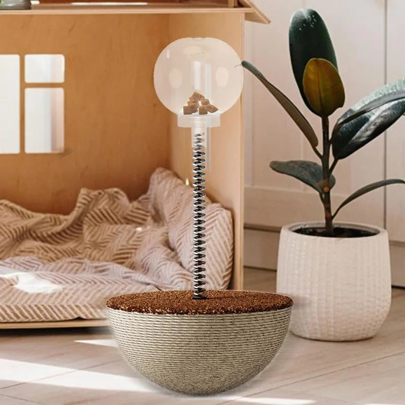 Auto-balancing cat interactive food puzzle toy in tumbler style on a floor