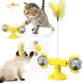 Cat turntable windmill toy with self-balancing swing and rotating modes, available in multiple colours, on a wooden floor