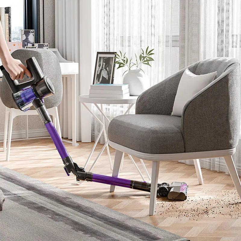 Black and purple brushless foldable handheld vacuum cleaner on a plain background