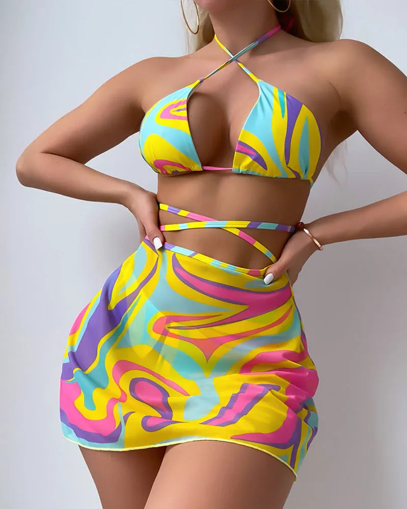 Yellow striped halter-neck lace-up swimsuit top with matching skirt and shorts for women