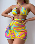 Yellow striped halter-neck lace-up swimsuit top with matching skirt and shorts for women