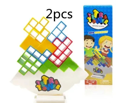Plastic balance stacking board game with 16 coloured blocks, chassis, and base on a 26.5cm square box.