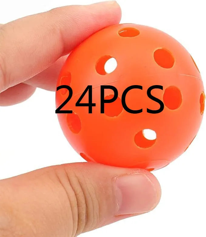 Assorted multi-colour 42mm golf practice balls with a net bag, shown next to practice putting holes.