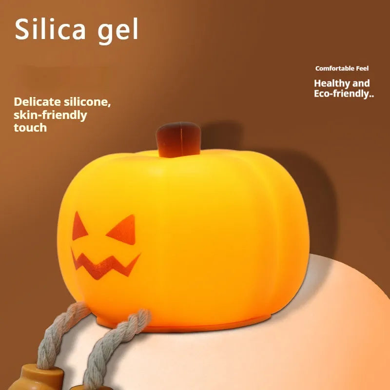 Soft silicone pumpkin-shaped night light with orange colour and touch dimming controls