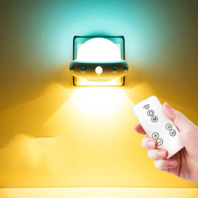 Remote control UFO bedside night light in blue, pink, or white with colourful LED lighting