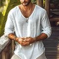 Men's beige slim fit V-neck long sleeve t-shirt made from hemp blend fabric on a hanger.