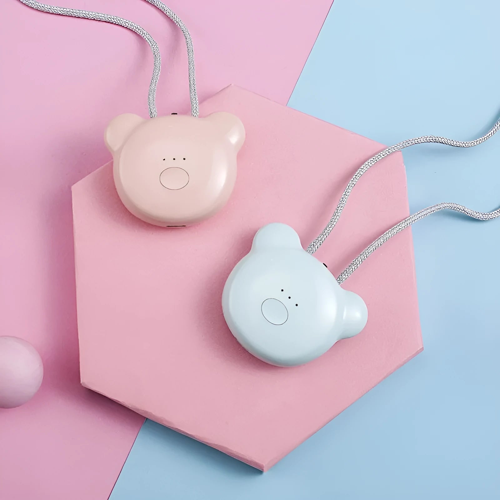 Mini USB portable air purifier necklace in blue, shown worn and with USB cable.