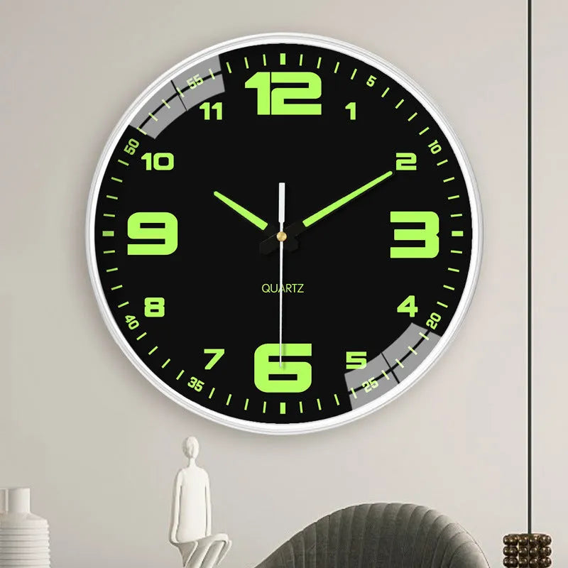 Modern 8-inch luminous wall clock with white face and black numbers on a wall.