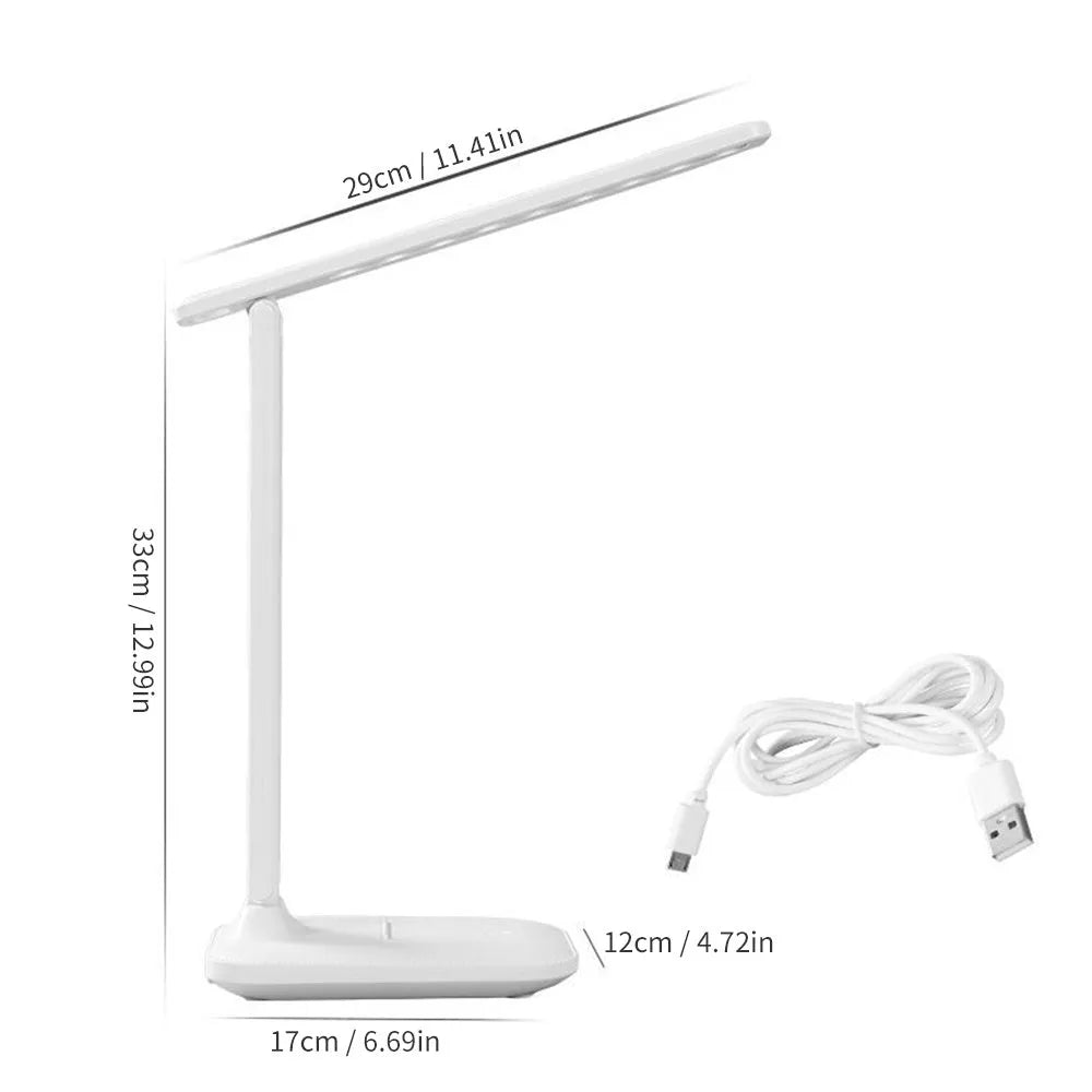 White plastic children's bedside lamp with touch dimming controls and USB charging port