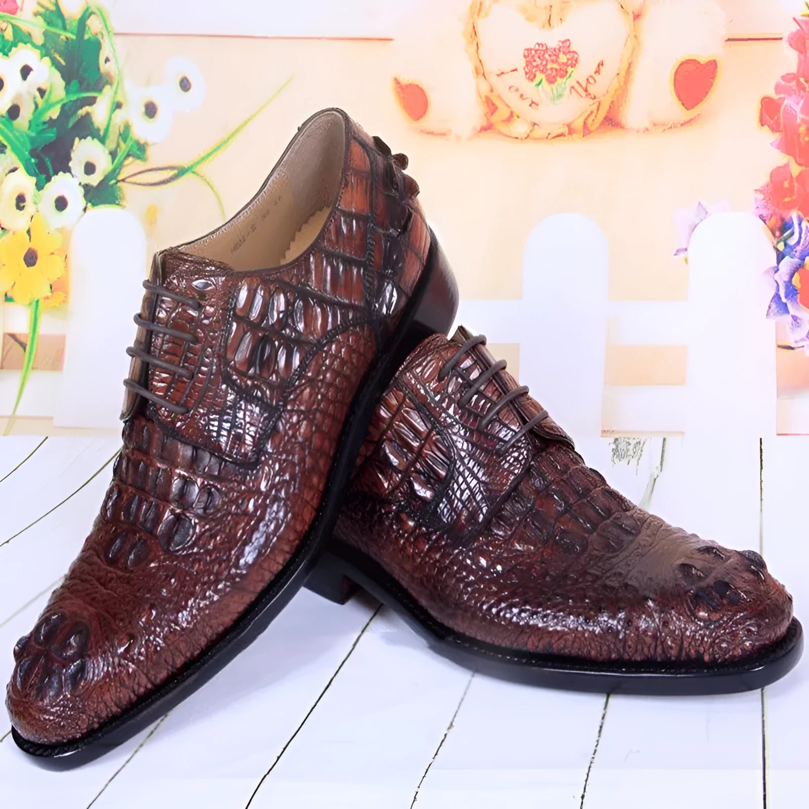 Men's brown crocodile skin leather business dress shoes with leather sole, side view