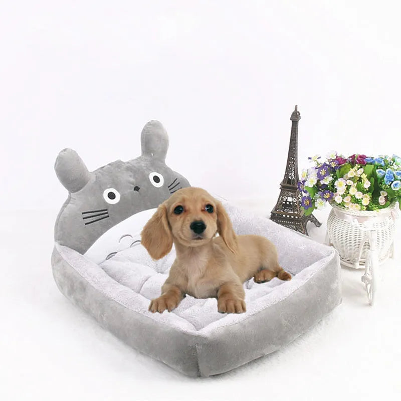 A cartoon-style soft plush pet bed sofa for small dogs and cats, shown in blue colour.