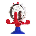 Blue interactive pet puzzle feeder toy with rotating spinner and suction cup base