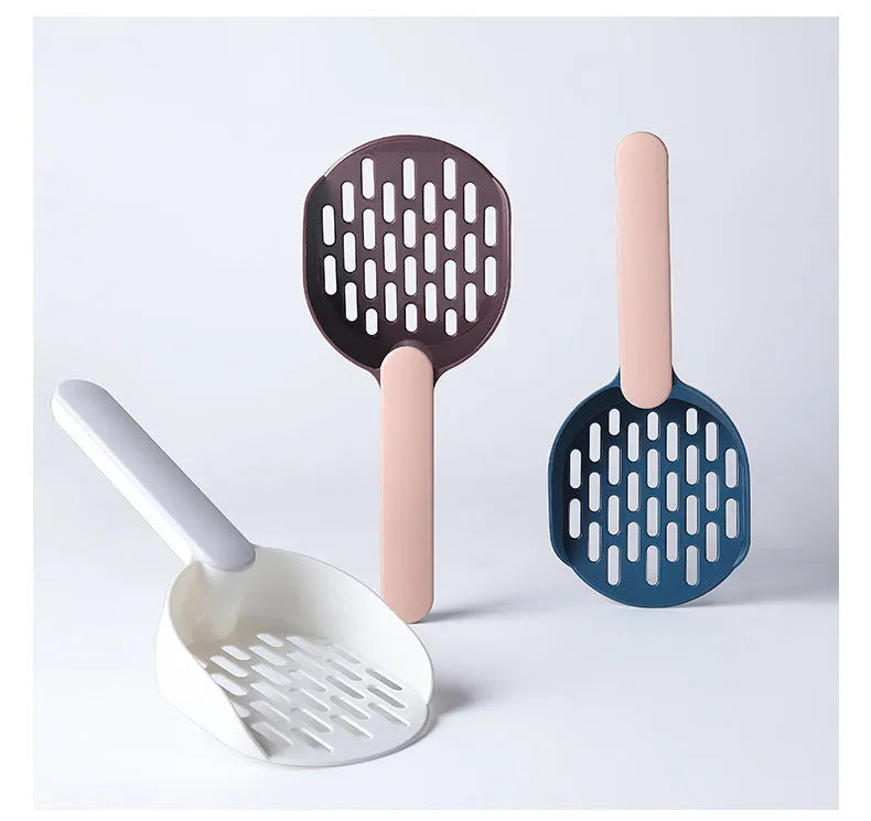 Blue plastic cat litter shovel scoop for cleaning litter boxes, shown next to a litter tray.