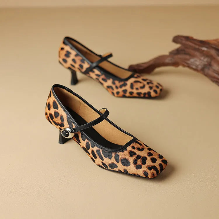 Black women's square toe stiletto heel ankle-strap shoes with a textured horse hair upper.