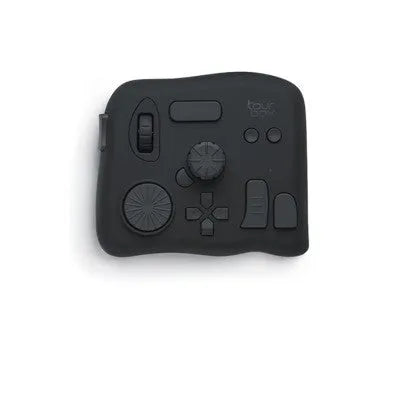TourBox NEO black auxiliary keyboard for video editing and digital creation on a desk