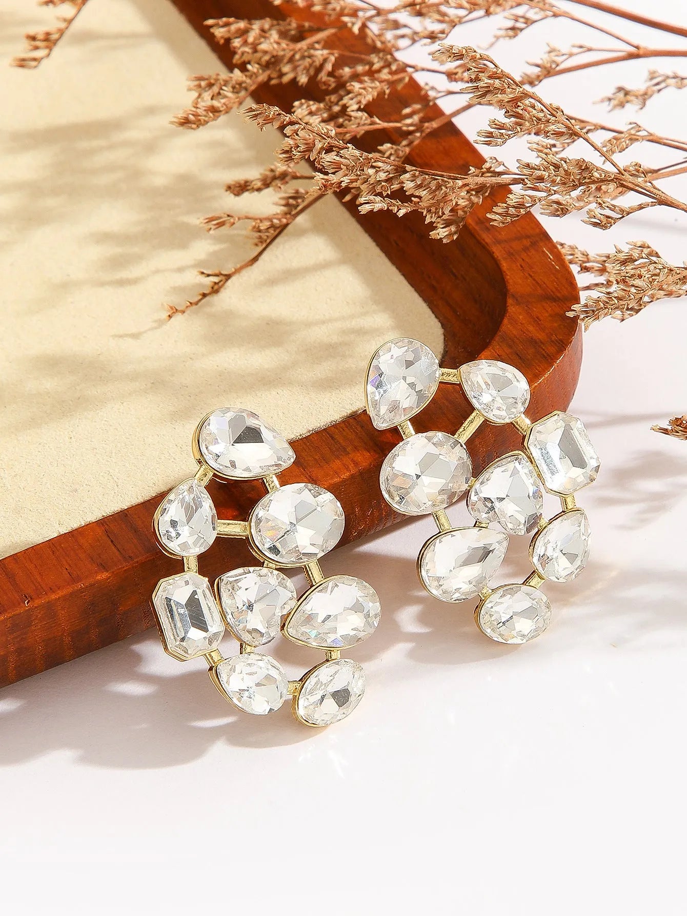 Hot selling fashionable alloy diamond studded earrings in a range of colours including green, pink, purple, red, and white
