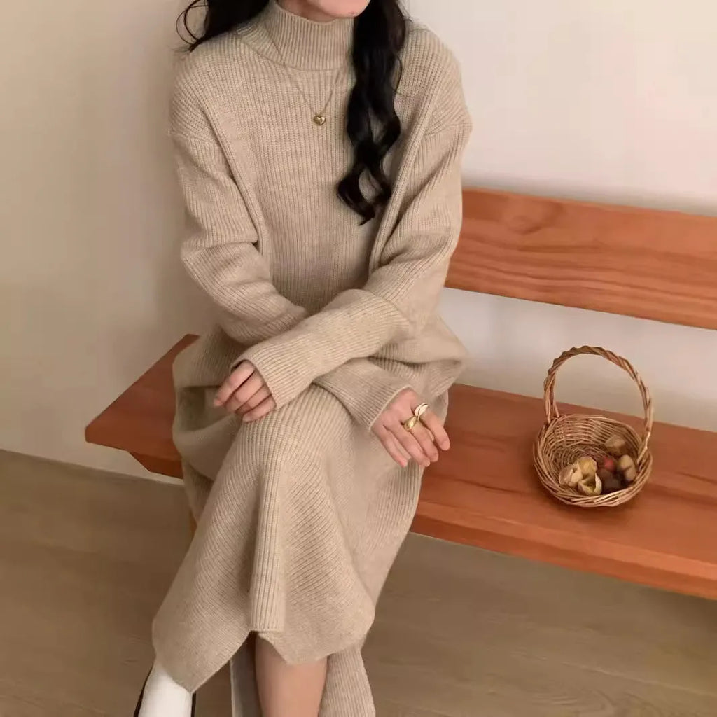 Women's beige half-turtleneck long sleeve knitted dress with a high waist and knee-length skirt.