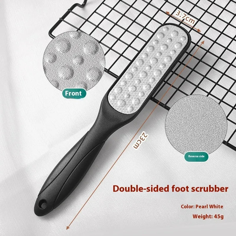 A stainless steel double-sided foot grinder with sandpaper files on a white background.