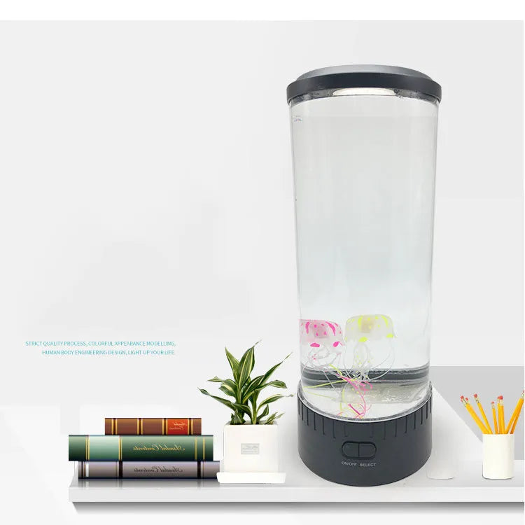 Black jellyfish LED light with acrylic shade on a desk, 35cm tall, USB powered