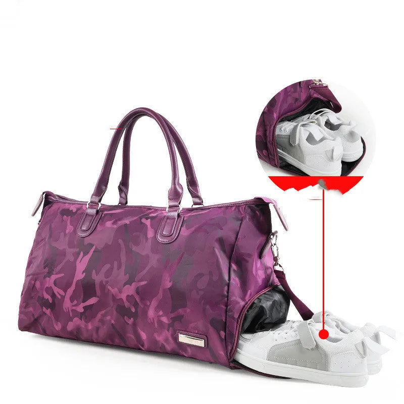 Nylon travel bag in black with soft handle, top zipper, and multiple internal pockets