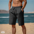 Men's cotton linen drawstring shorts with elastic waist and multiple pockets in solid colour