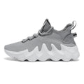 Men's low-top sock-like sports shoes in grey with a round toe, flat heel, and lace-up front.