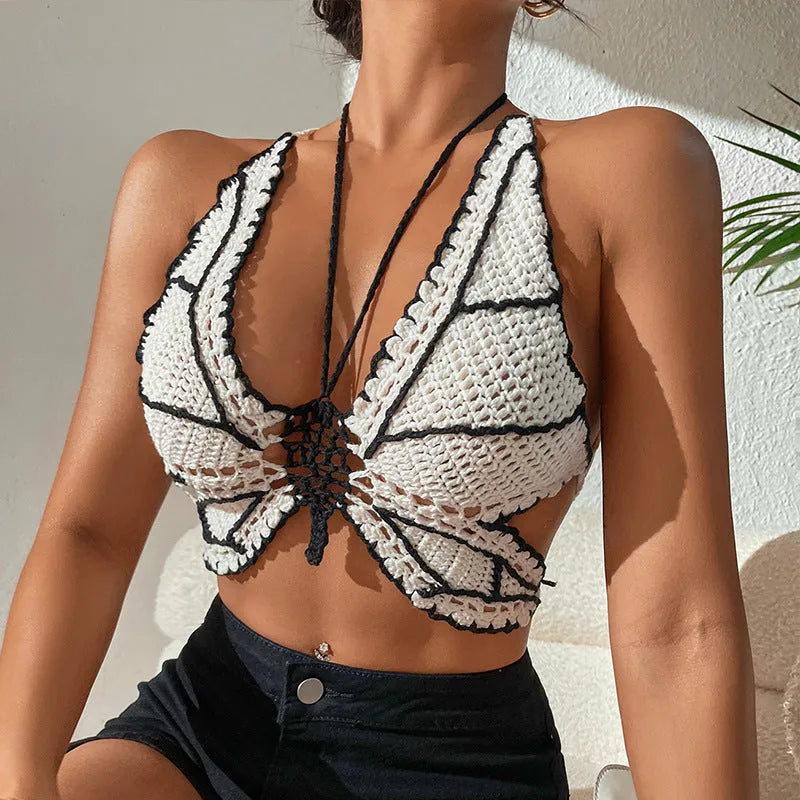 Women's black and white classic bikini swimsuit set on a mannequin.