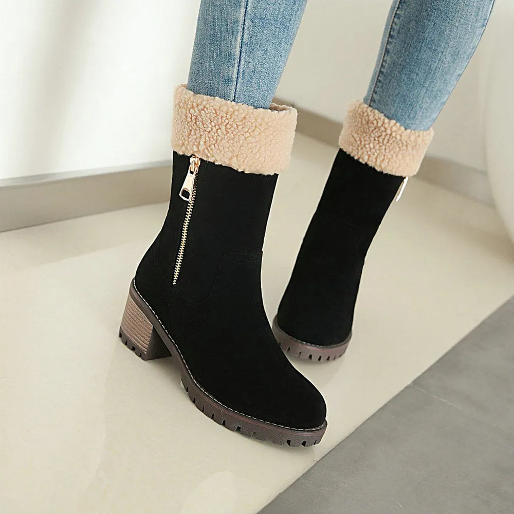 Black waterproof rubber snow boots with a thick sole and plush lining.