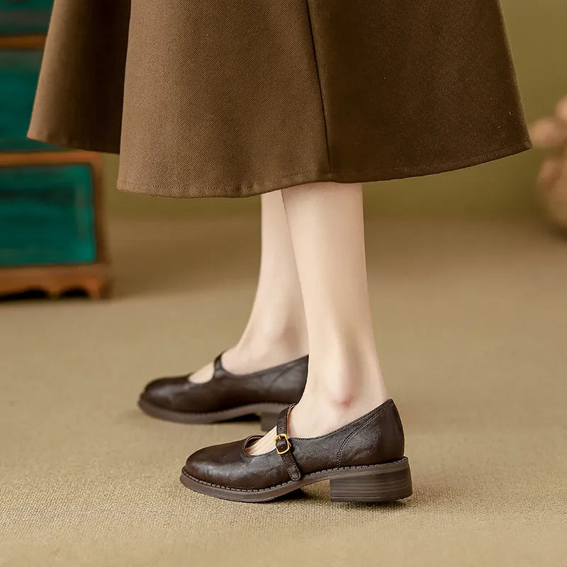 Thick-soled extra height black leather shoes for women with round toe and low top