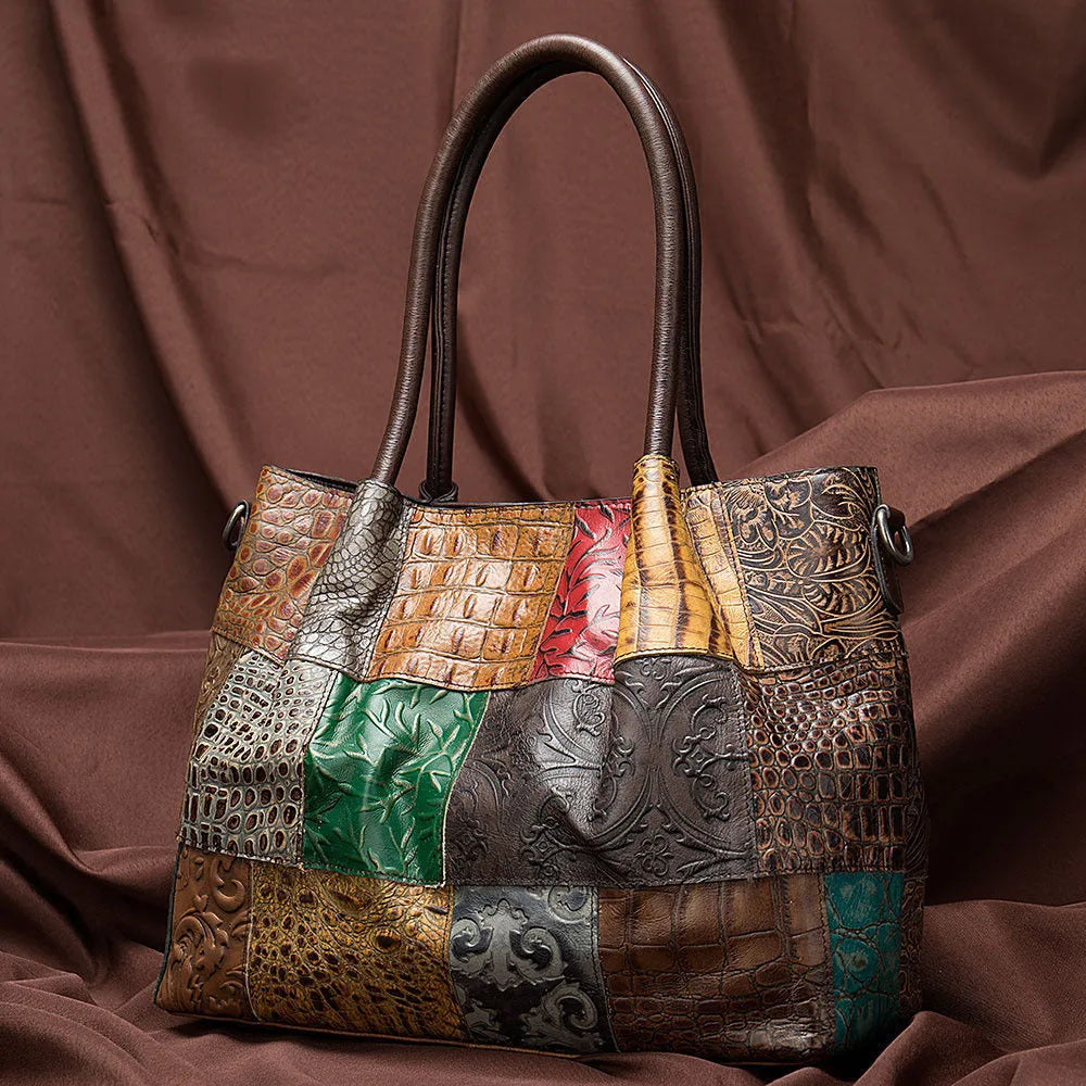 Women top layer cowhide medium handbag with contrast geometric embossing, soft handle, and open-top design