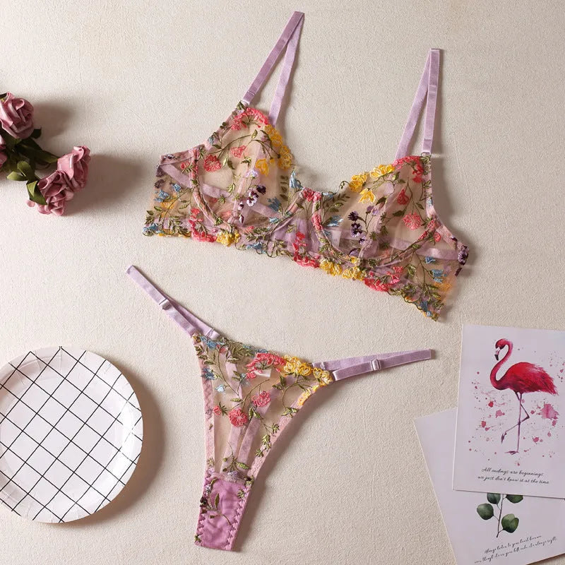 Floral patterned mesh bra with steel ring and matching T-back briefs in a choice of colours.