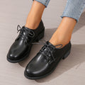 Black women's professional work shoes with chunky heel and low top design