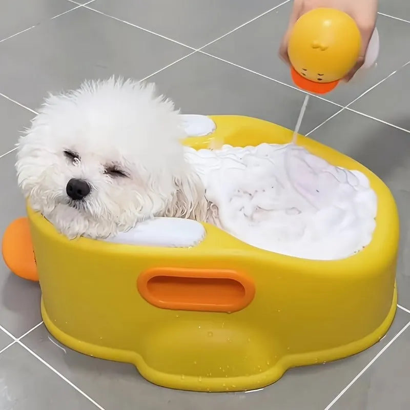 Blue PVC duck-shaped portable bathtub for washing dogs and cats, shown folded and unfolded.