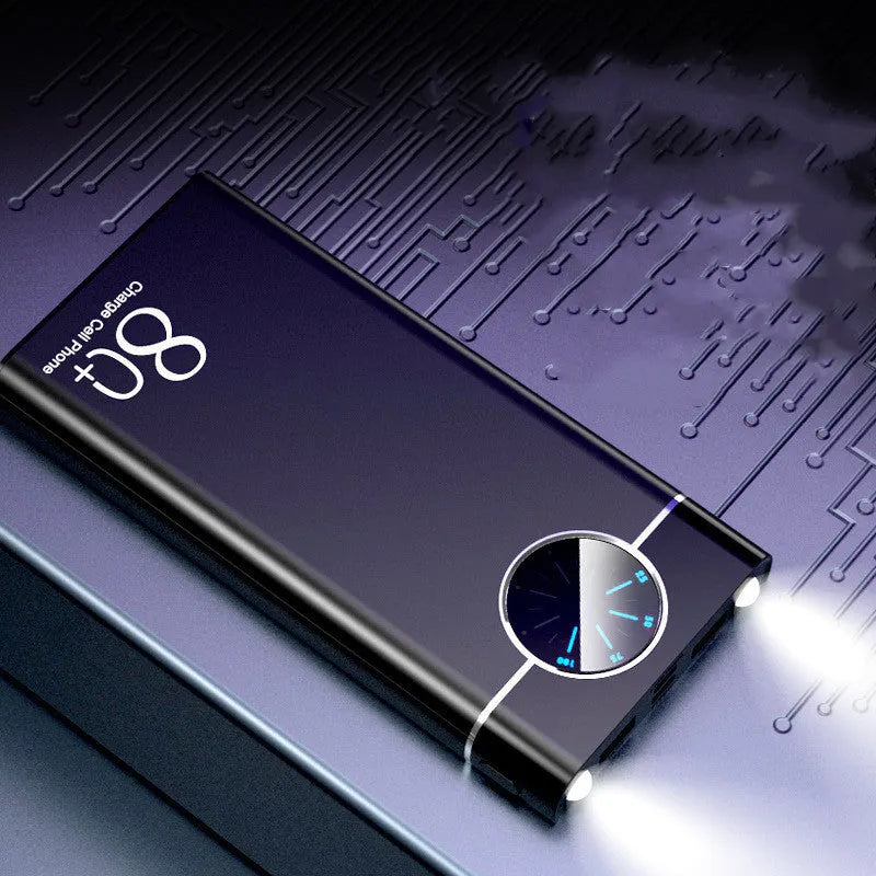 Black alloy fast charging power bank showing front with USB ports and LED flashlight.
