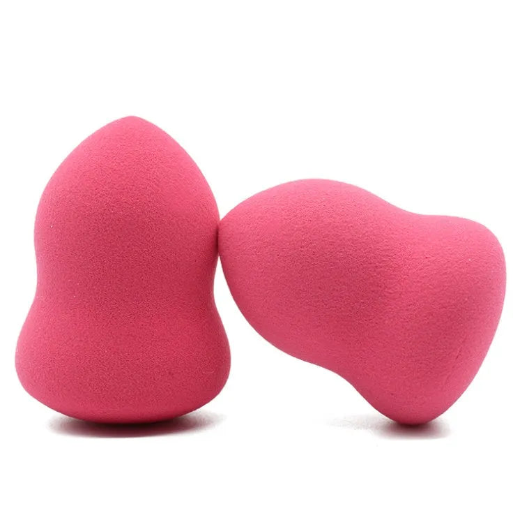 Pink makeup foundation sponge on white background showing soft texture and 4x4x5.6cm size
