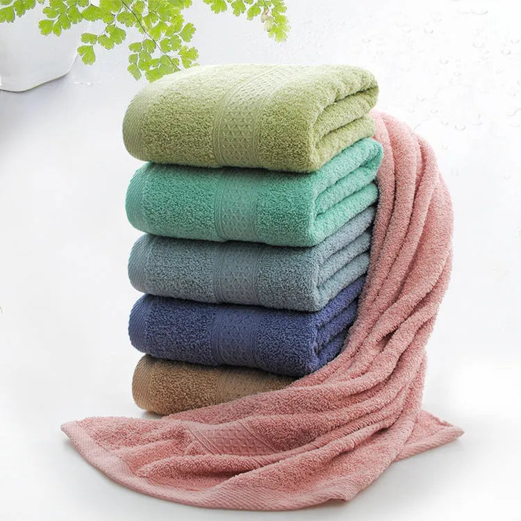 Thickened cotton blend bath and beach towel shown in one of its available colours like apple green or dark blue