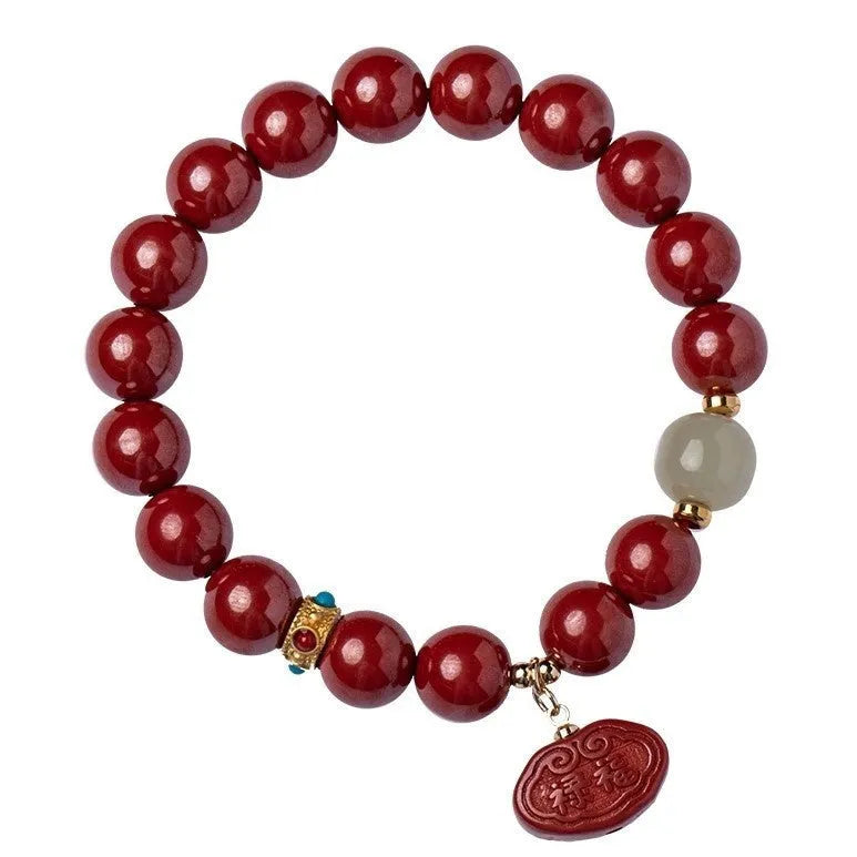 Natural cinnabar Emperor Sandstone bracelet with Ping An Fu Lu design in 8mm or 10mm bead size