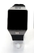 White smart watch with Bluetooth call function showing its 1.44-inch touch screen on a wrist.