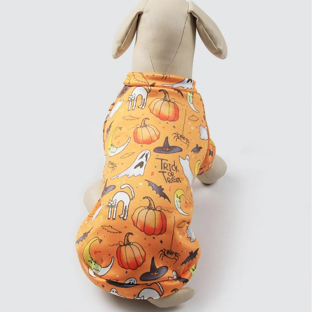 Wansheng fleece-lined dog sweater in an apricot colour with a matching triangular scarf, shown on a model dog.