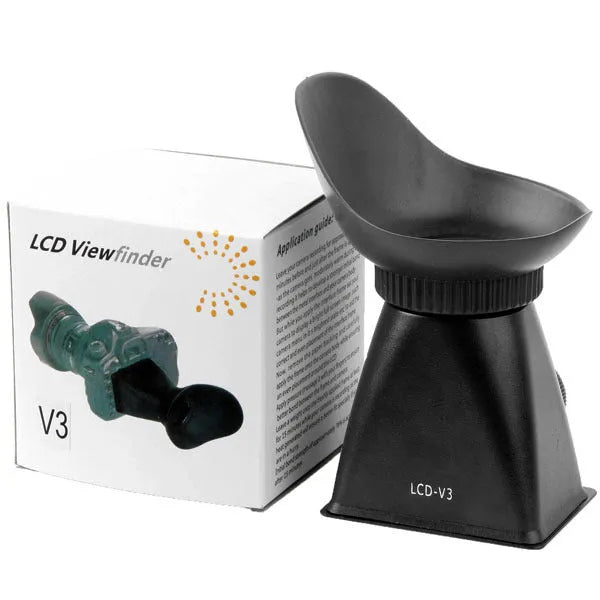 Black camera viewfinder magnifier with magnetic mount attached to a DSLR LCD screen.