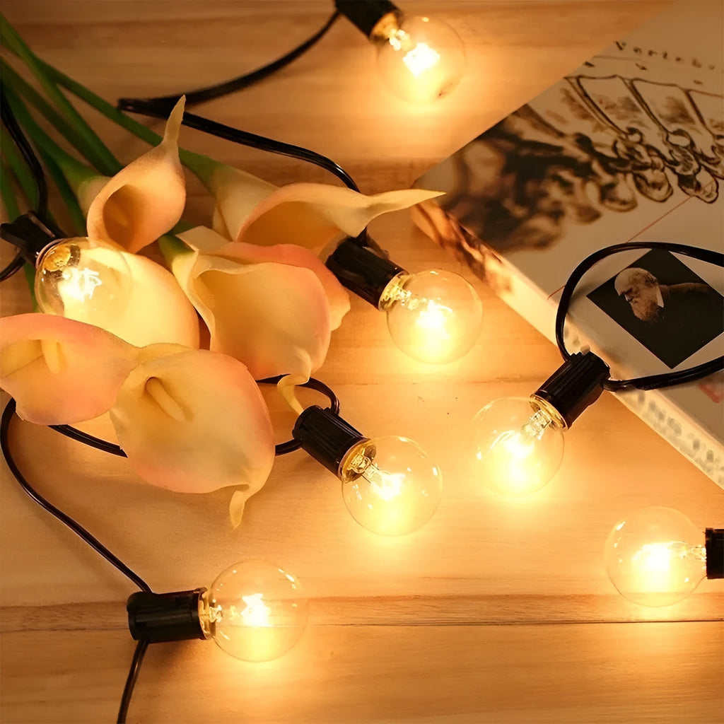 Outdoor waterproof LED lighting chain with warm light, plastic shell, IP44 rating, available in 7.5m, 16.5m, and 26.5m lengths.