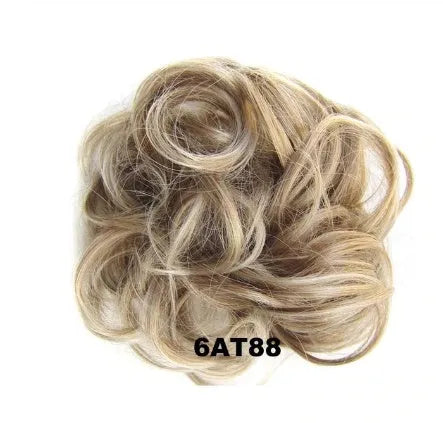 Adjustable hair ring in a natural black shade for creating hair buns and ponytails