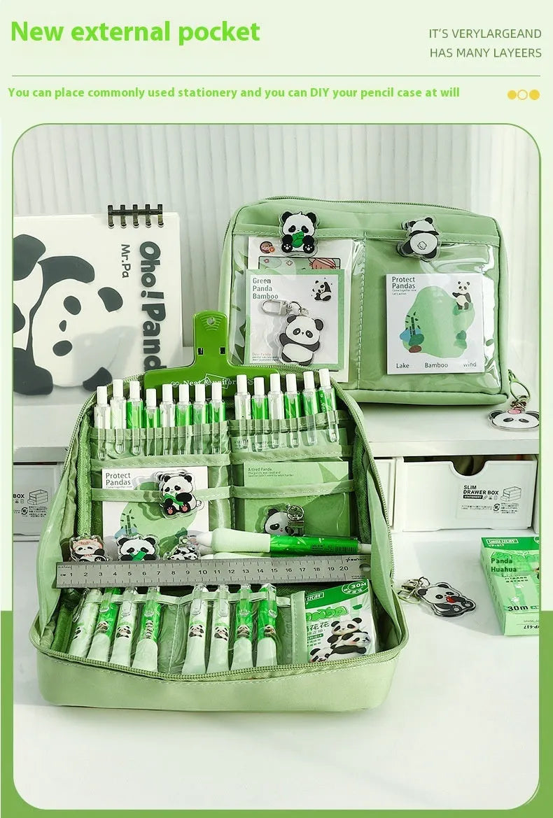Green canvas panda pencil case showing twelve layered compartments open to reveal storage space