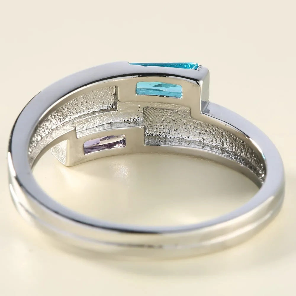 Silver colour copper electroplated ring with zircon inlay decoration showing European and American style design