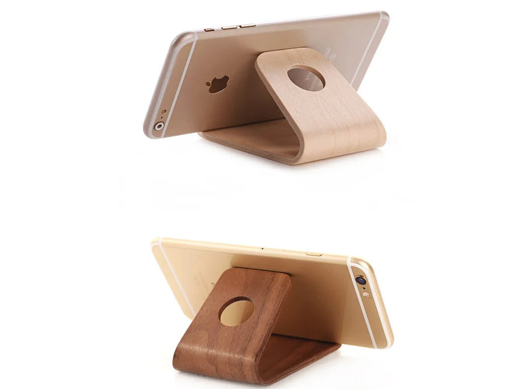 Wooden iPhone stand in walnut finish holding an Apple iPhone