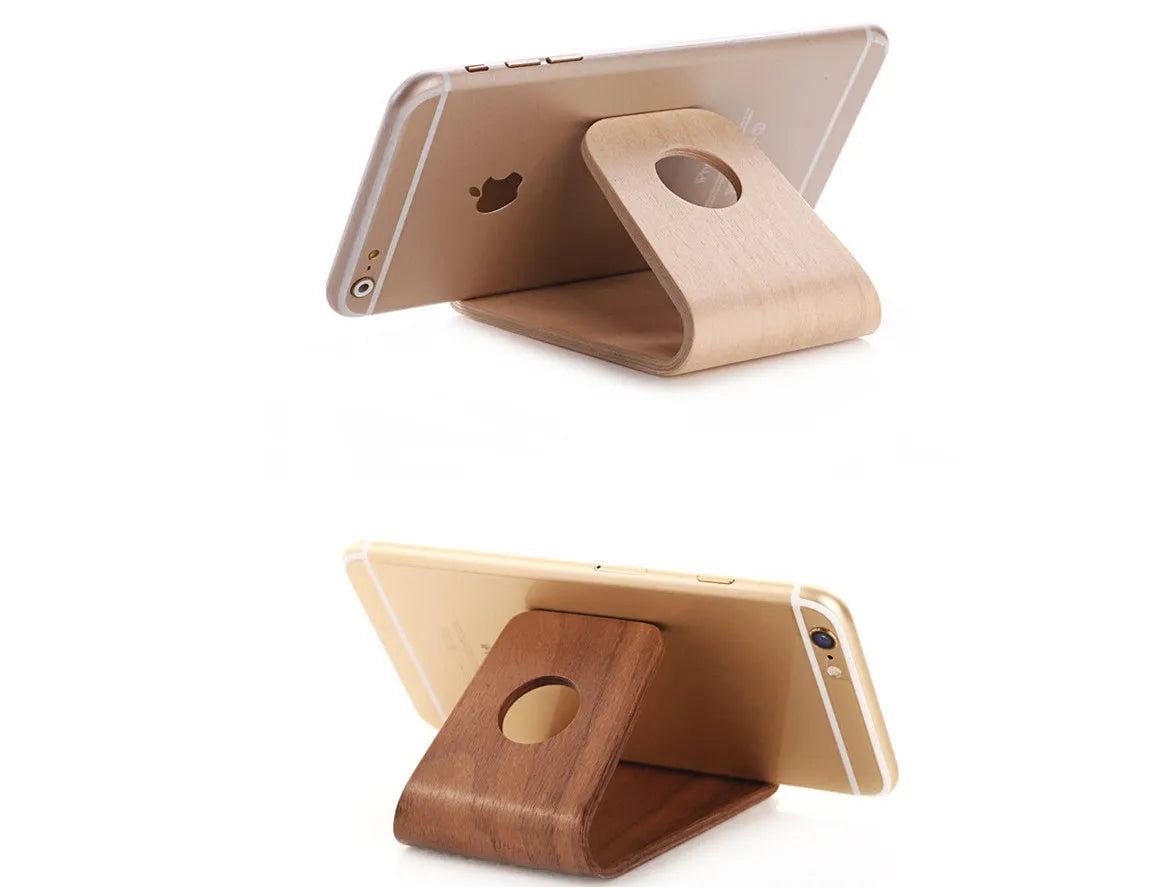 Wooden iPhone stand in walnut finish holding an Apple iPhone