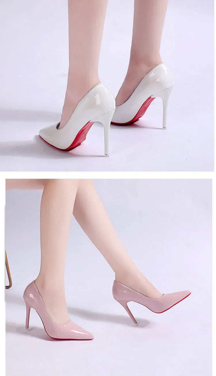 Women's black pointed toe stiletto pumps with a shallow mouth design on a white background.