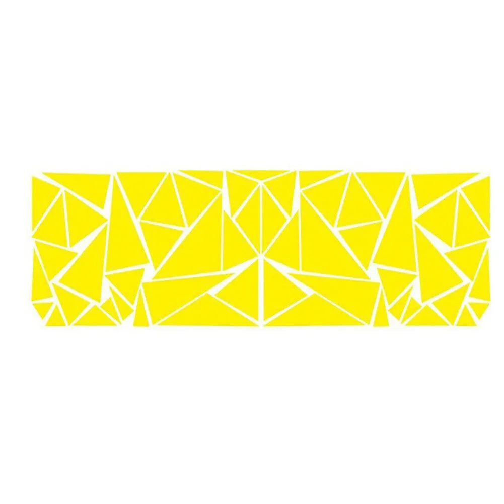 Long black geometric pattern car sticker laid flat, showing its 200cm length for wheel arch application.