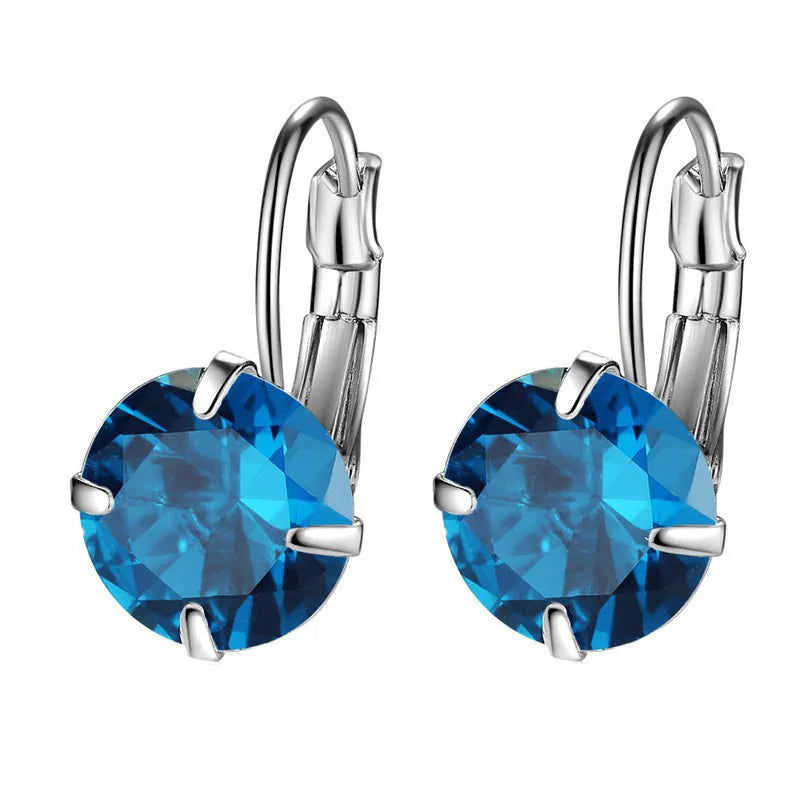 Single zircon ear clip in brass with AA zircon stone rhinestone inlay geometric shape, available in multiple colours