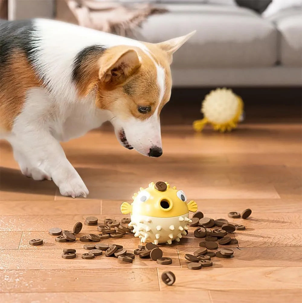 Fish-shaped interactive TPR dog toy with treat dispenser and dental-cleaning surface particles